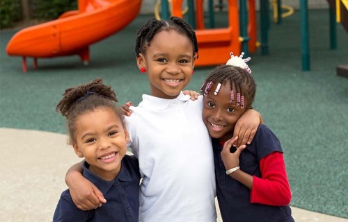 Operation Breakthrough students enjoy recess time.