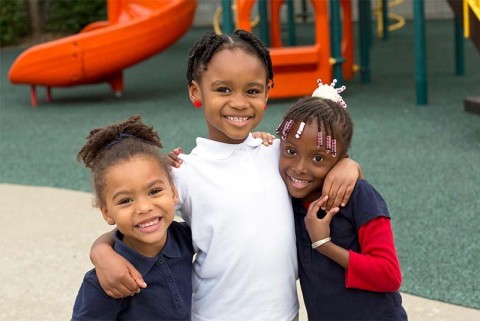 Operation Breakthrough students enjoy recess time.