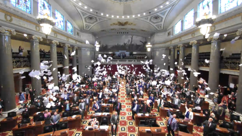 House members toss papers on last day of session.